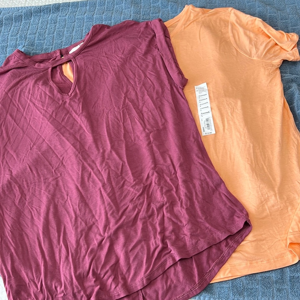 Two women’s tops. Both sz L but fit like a M